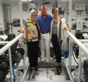 The Honorable Nancy Kopp; John D. Evans, IHV Board of Advisors Co-Chair; and Sheilah Kast, IHV Board of Advisors Member and WYPR Host touring the Waterford yacht, owned by Mr. Evans, and annually docked at the Baltimore National Harbor.